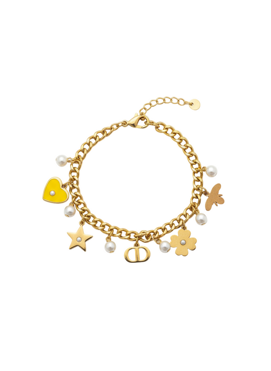 Bracelet doré avec cœur jaune et point blanc
